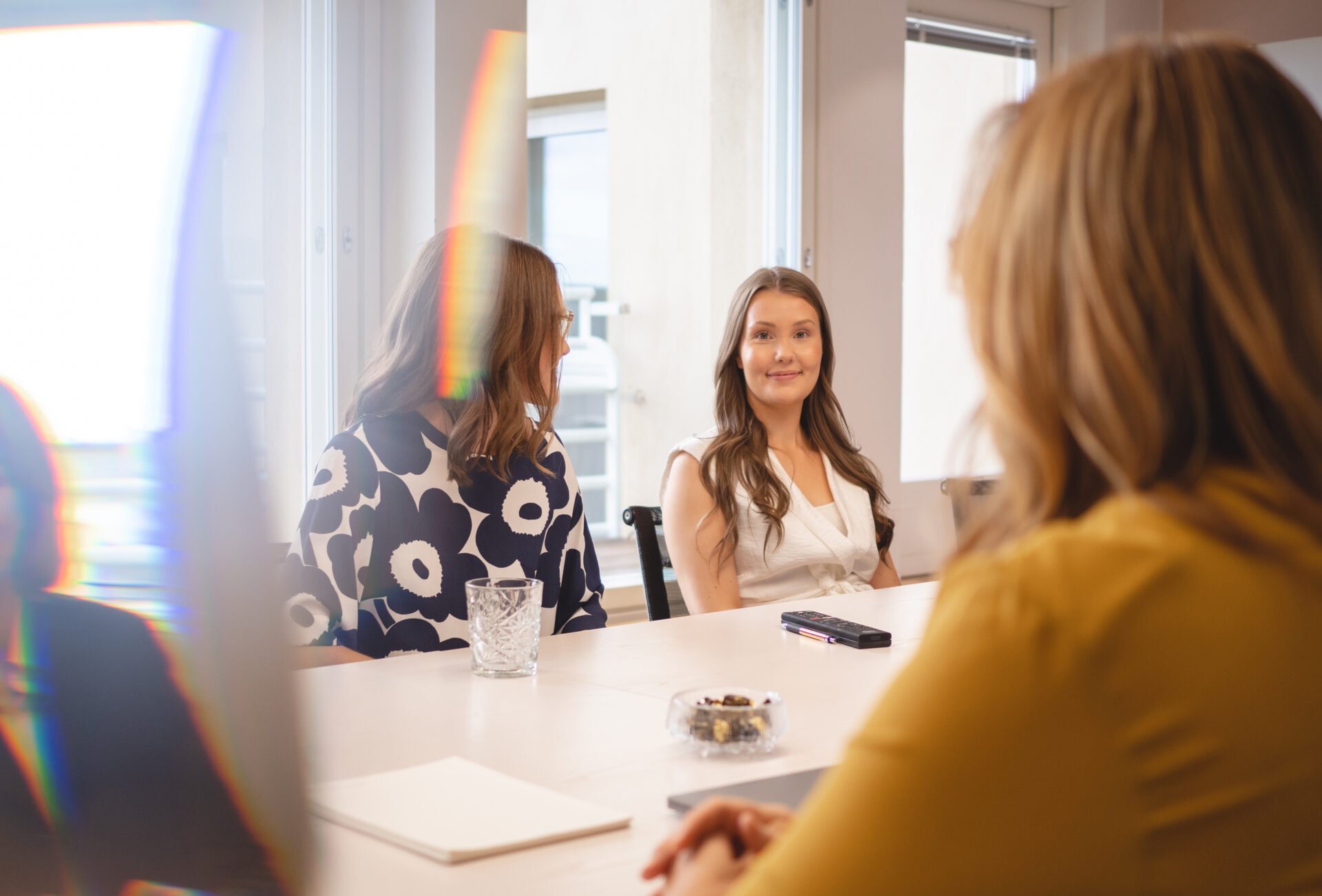 Woman smiling during a meeting in a law firm