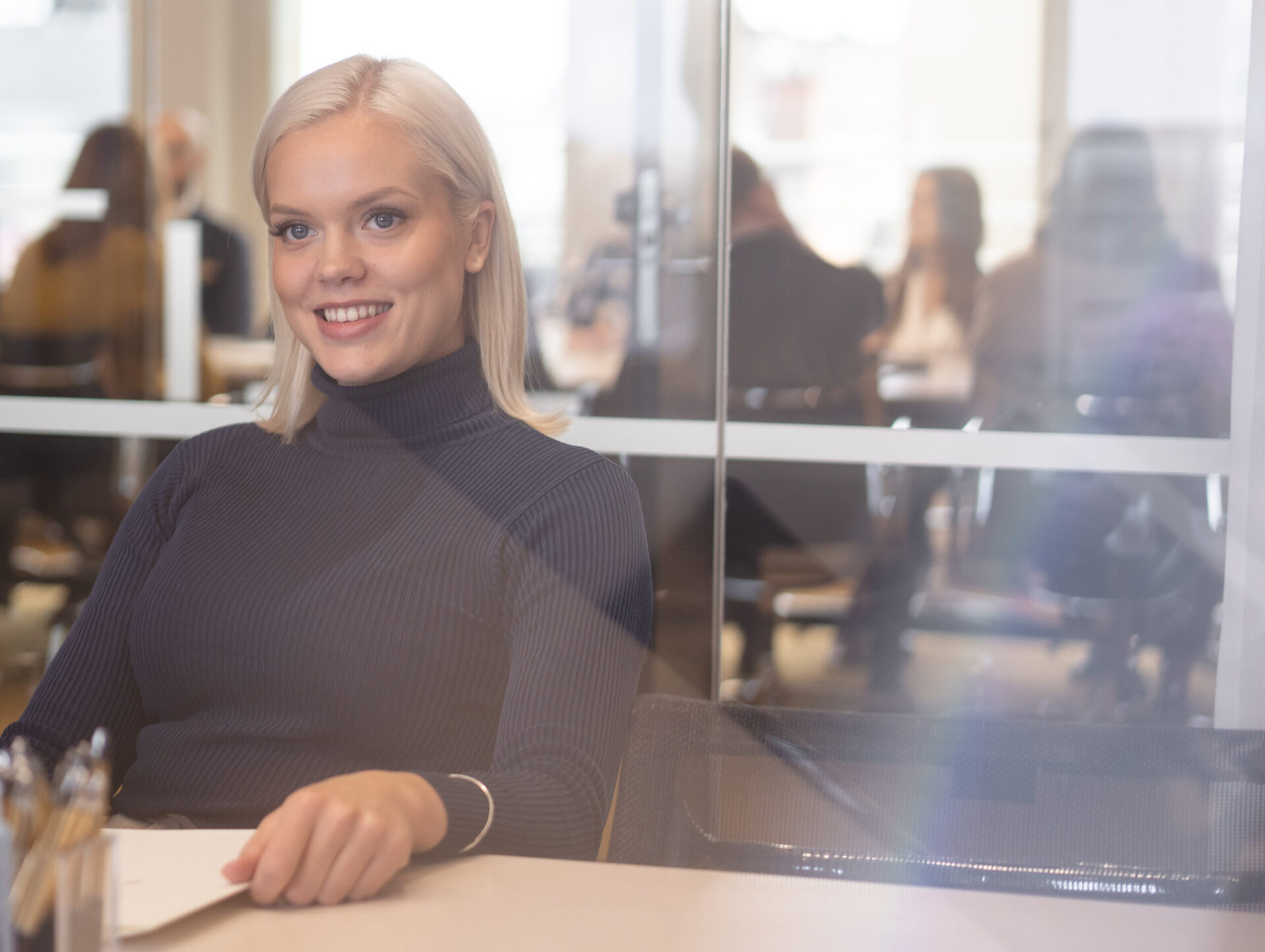 Woman smiling in the meeting room