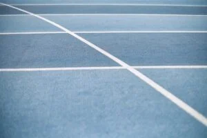 Running track symbolizing competition law practice in a law firm