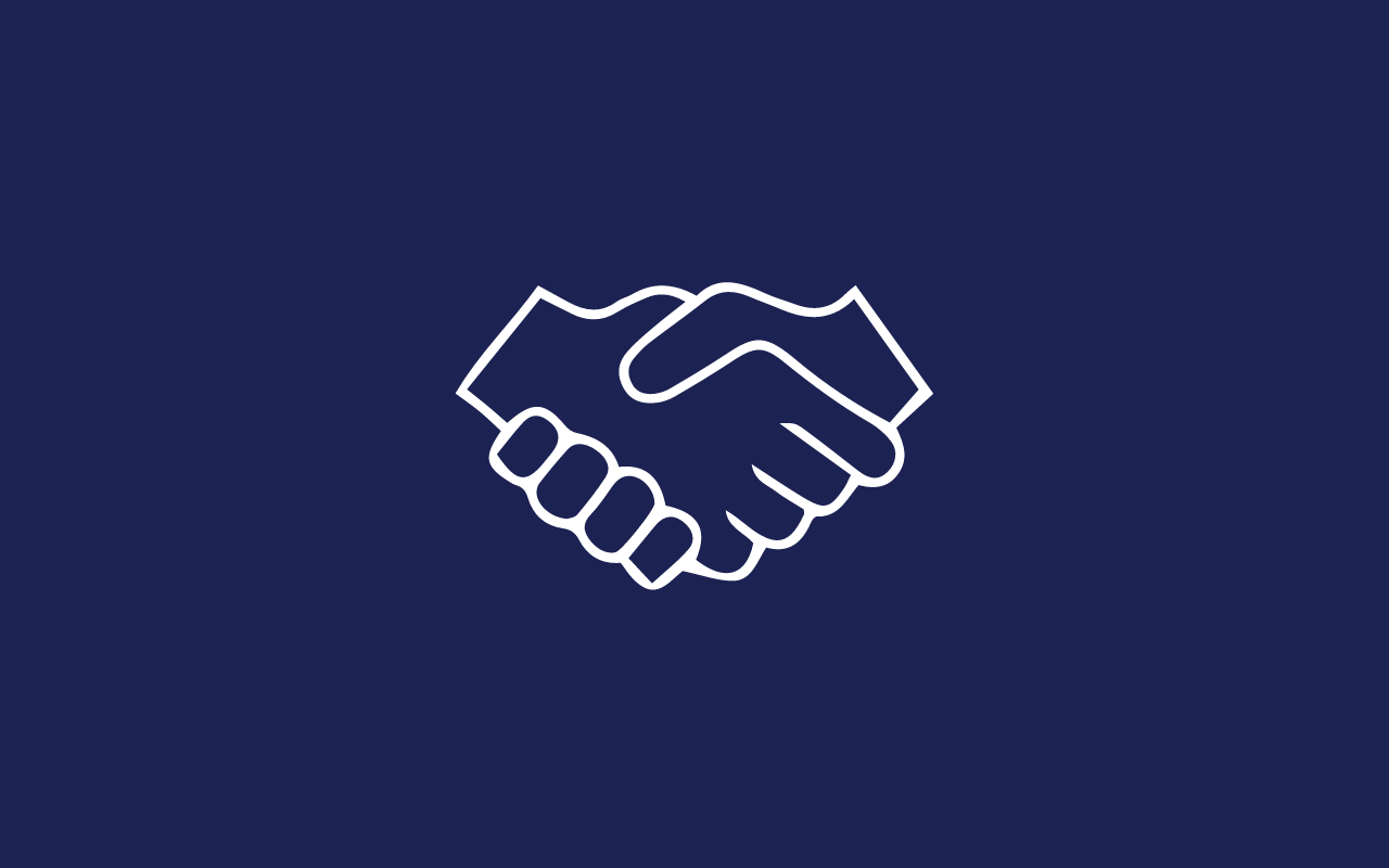 Close-up of a handshake symbolizing partnership and collaboration