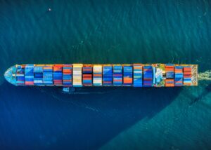 Aerial view of a cargo ship loaded with containers